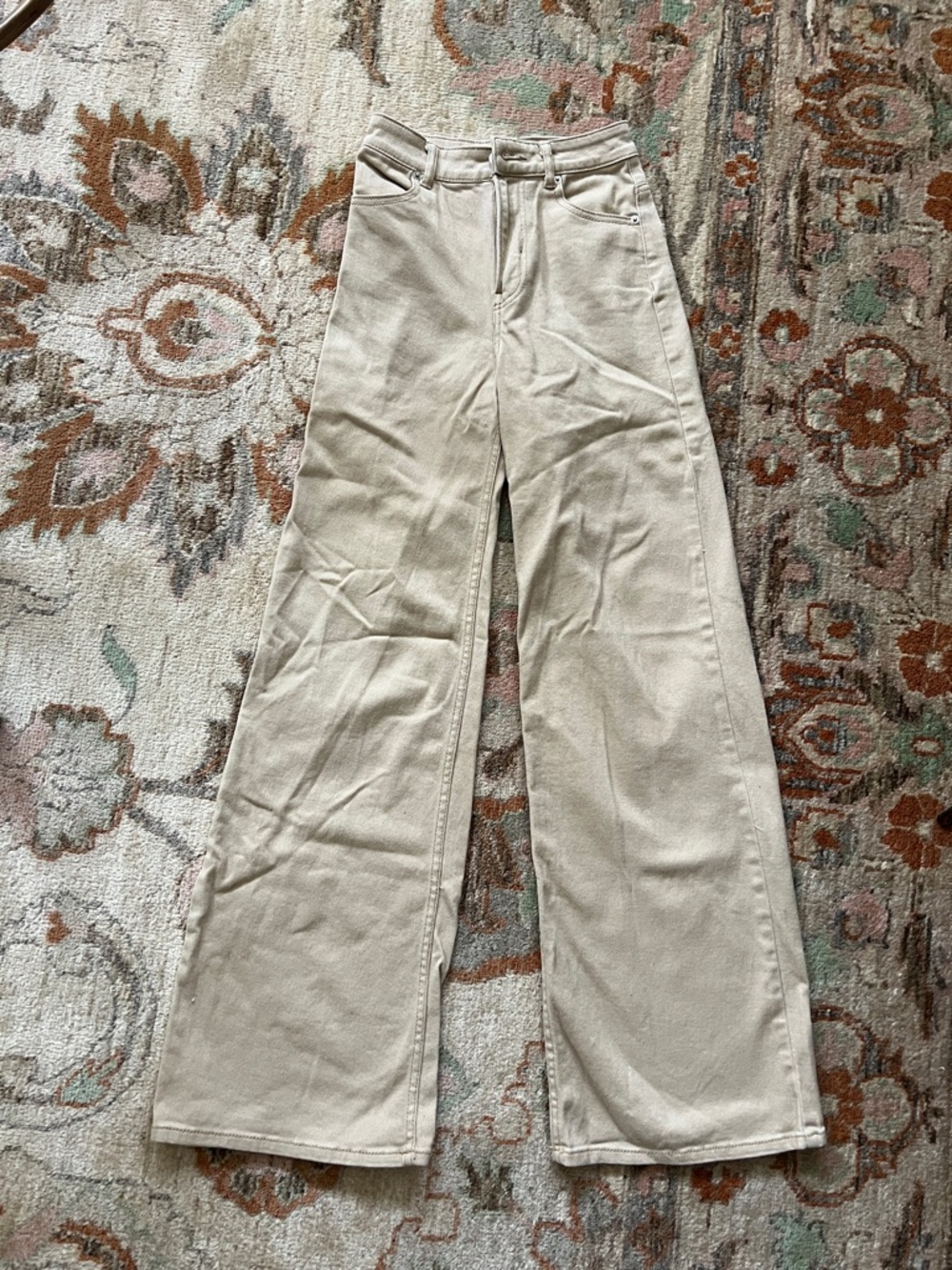 Trendy beige flare pants